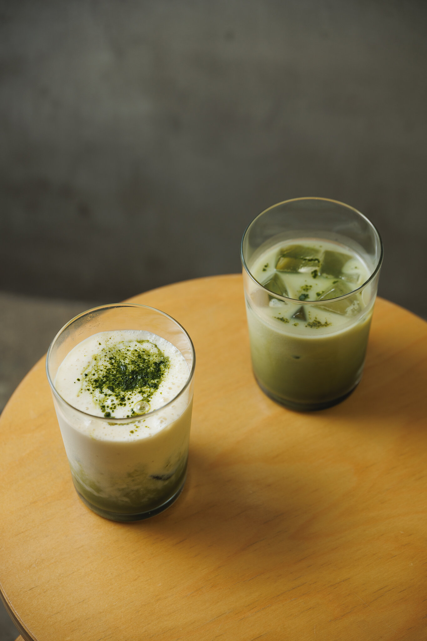 Matcha drinks on wooden table